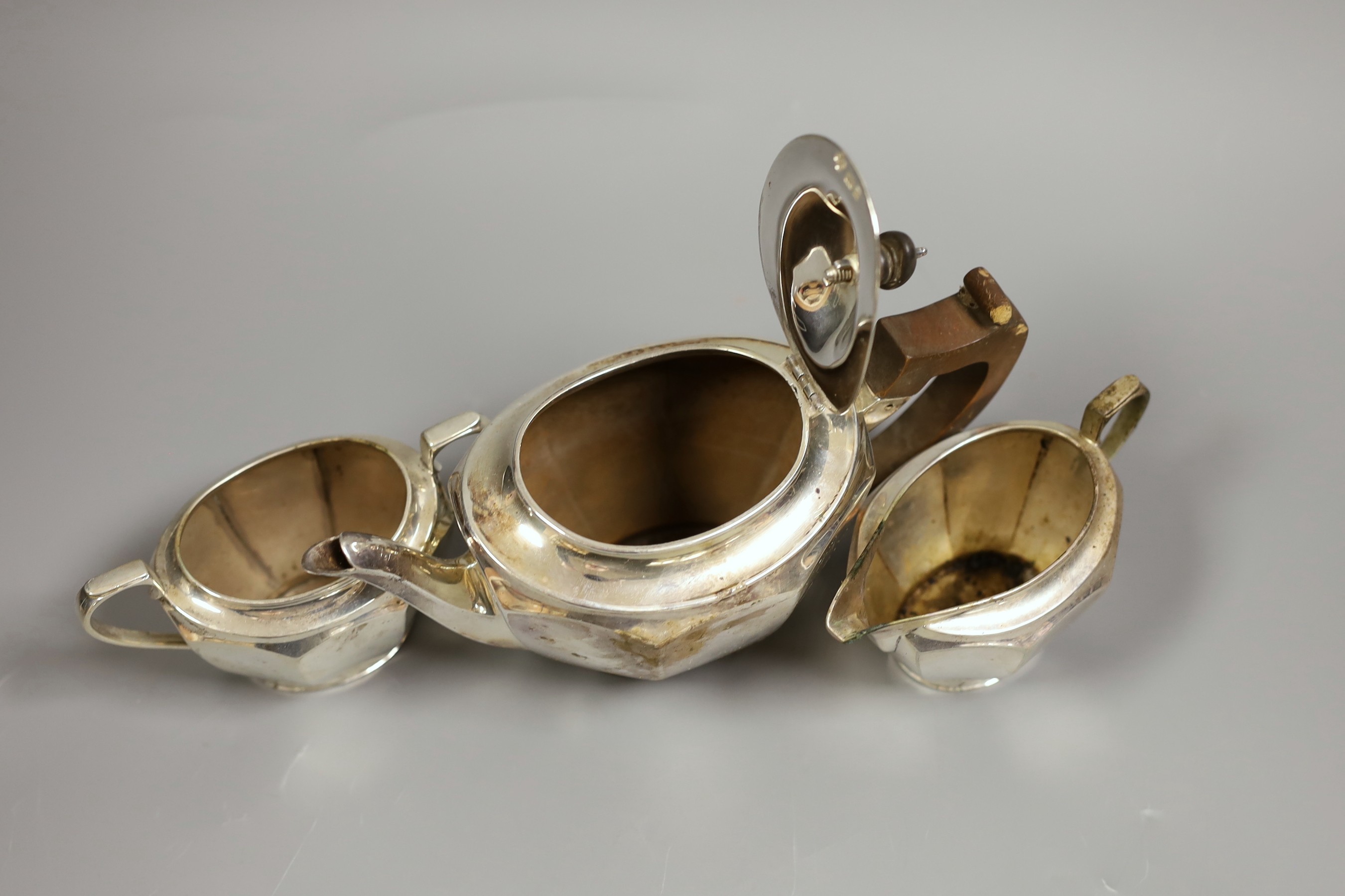 A George V silver three piece bachelor's tea set, Jay, Richard Attenborough & Co Ltd, London, 1926, gross weight 15.75oz.